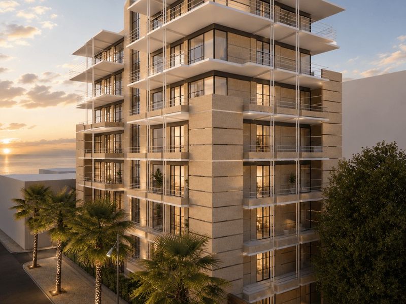 Palazzo Stella a Loano — Rendering della facciata di Palazzo Stella al tramonto con palme illuminate e vista sul mare